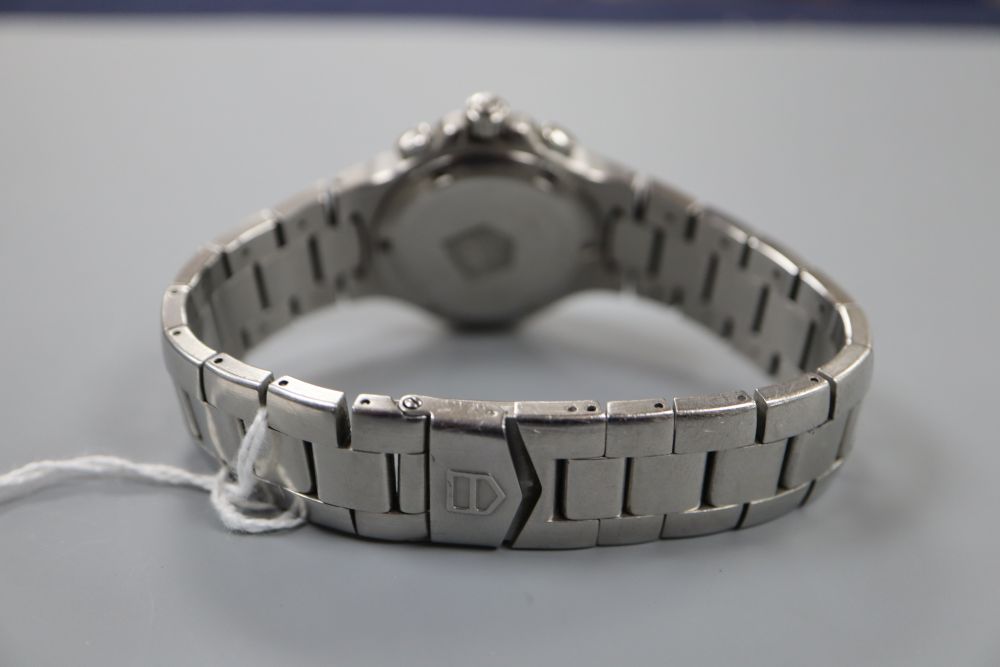 A ladys stainless steel Tag Heuer Professional quartz wrist watch, on stainless steel Tag bracelet.